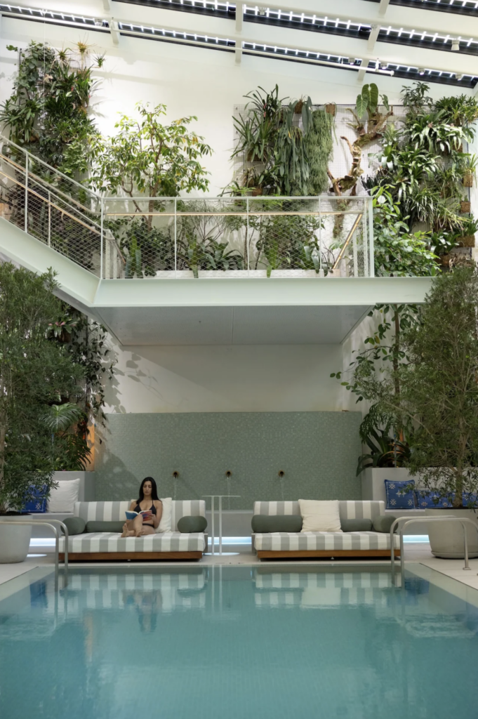 girl lounging on pool bed